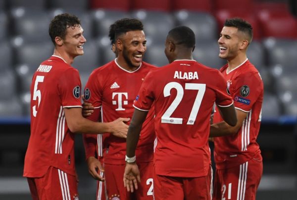 Bayern Munich's French midfielder Corentin Tolisso (2nd L) celebrates scoring the 3-0 goal with his team-mates during the UEFA Champions League Group A football match FC Bayern Munich v Atletico Madrid in Munich, southern Germany on October 21, 2020. PHOTO | AFP