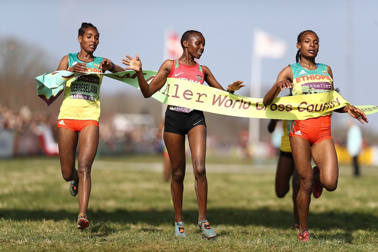 Beatrice Chebet (centre) breasts the tape to tale the Women Under 20 crown at the 2019 IAAF World Championships in Aarhus, Denmark. PHOTO/IAAF