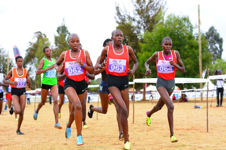 Beatrice Chebet (left) on her way to winning the junior 6km national cross title at Eldoret Sports Club on Saturday, February 23, 2019. PHOTO/Courtesy