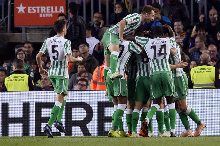 Betis players celebrate a goal during the Spanish league football match between FC Barcelona and Real Betis at the Camp Nou stadium in Barcelona on November 11, 2018. PHOTO/AFP