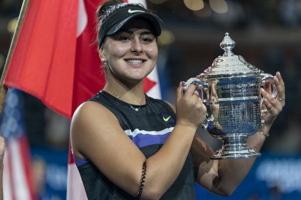 Bianca Andreescu of Canada poses with the trophy after her US Open Championships women's singles final match against Serena Williams (not seen) of USA at Billie Jean King National Tennis Center in New York, United States on September 7, 2019. PHOTO | AFP