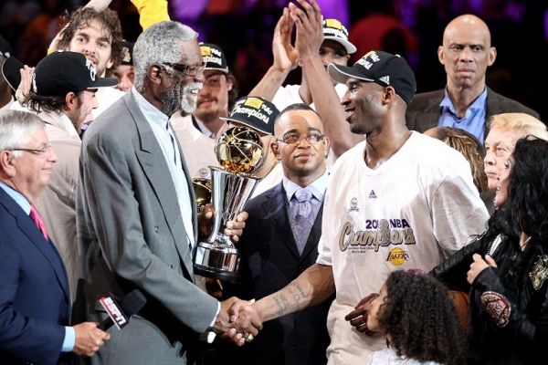Bill Russell presents the Bill Russell Finals MVP trophy to Kobe Bryant #24 of the Los Angeles Lakers after the Lakers defeated the Boston Celtics in Game Seven of the 2010 NBA Finals at Staples Center on June 17, 2010 in Los Angeles, California. PHOTO | AFP