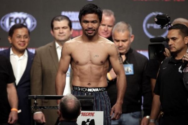 Boxer Manny Pacquiao from the Philippines poses during his weigh-in for the fight against Keith Thurman from the USA on July 19, 2019, at the MGM Grand Hotel and Casino in Las Vegas, Nevada. PHOTO/ AFP