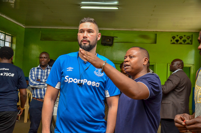 Boxing promoter Thomas Mutua Kiswili (right) shows retired WBC champion Tony Bellew around the Pal Pal Gym in Nairobi on March 21, 2019. PHOTO/SPN