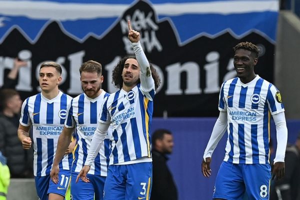 Brighton's Spanish defender Marc Cucurella (C) celebrates with teammates after scoring their second goal during the English Premier League football match between Brighton and Hove Albion and Manchester United at the American Express Community Stadium in Brighton, southern England on May 7, 2022. PHOTO | AFP