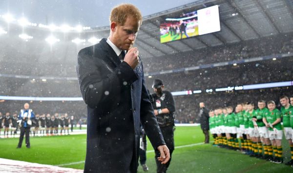 Britain's Prince Harry, Duke of Sussex, returns after laying a wreath on the pitch ahead of the autumn international rugby union match between England and New Zealand at Twickenham stadium in south-west London on November 10, 2018, to mark Armistice Day, and the 100th anniversay of the enfd of WWI. PHOTO | AFP