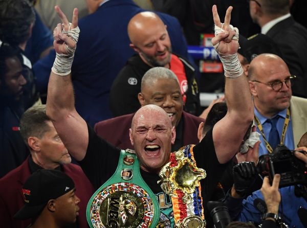 British boxer Tyson Fury celebrates after defeating US boxer Deontay Wilder in the seventh round during their World Boxing Council (WBC) Heavyweight Championship Title boxing match at the MGM Grand Garden Arena in Las Vegas on February 22, 2020. PHOTO | AFP