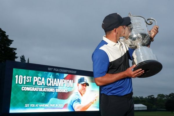 Brooks Koepka of the United States poses with the Wanamaker Trophy during the Trophy Presentation Ceremony after winning the final round of the 2019 PGA Championship at the Bethpage Black course on May 19, 2019 in Farmingdale, New York. PHOTO/AFP