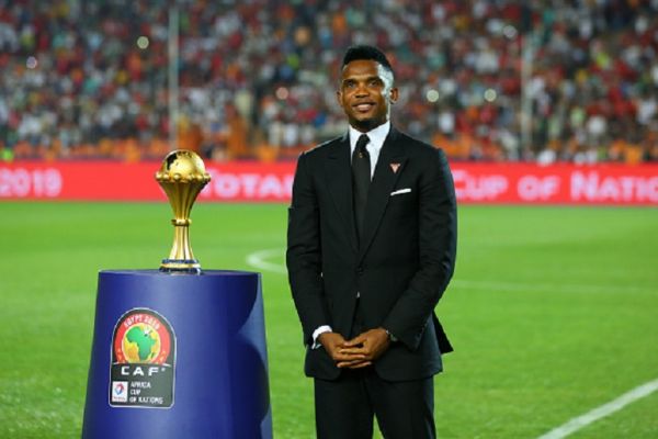 Cameroonian former footballer Samuel Eto'o holds the Africa Cup of Nations trophy prior to the start of the Africa Cup of Nations final soccer match between Senegal and Algeria at the Cairo Stadium. PHOTO/ GETTY IMAGES