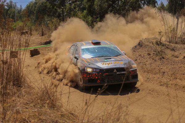 Carl 'Flash' Tundo in his Mitsubishi EVO X in a past rally. He is gearing to attempt a record-setting sixth Safari Rally crown in July. PHOTO/Courtesy