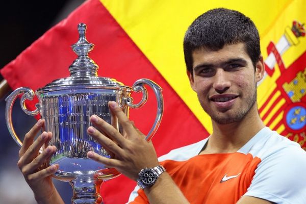 Carlos Alcaraz of Spain celebrates with the winners trophy after defeating Casper Ruud of Norway during their Men’s Singles Final match on Day Fourteen of the 2022 US Open at USTA Billie Jean King National Tennis Center on September 11, 2022 in the Flushing neighborhood of the Queens borough of New York City. PHOTO | AFP