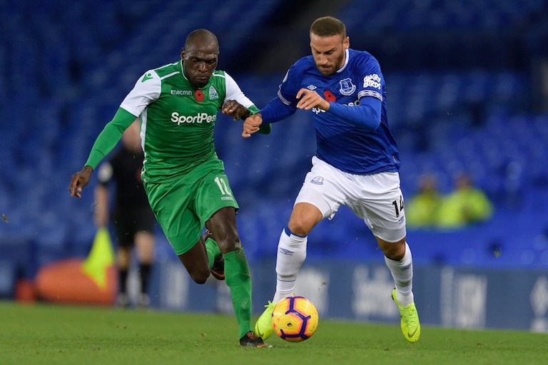 Cenk Tosun of Everton (right) vies for the ball with Gor Mahia FC’s Sammy Onyango during their SportPesa Trophy clash at Goodison Park on November 6, 2018 in Liverpool, England. PHOTO/Getty Images