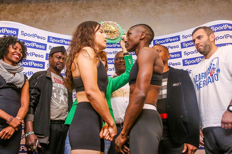 Challenger Yamileth Mercado (right) and champion Fatuma Zarika face-off during the weigh in of their WBC women Super Bantamweight title showdown in Nairobi on Friday, August 7, 2018. PHOTO/SPN