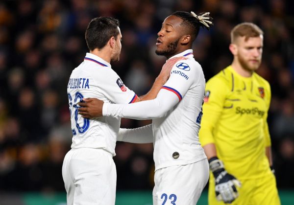 Chelsea's Belgian striker Michy Batshuayi (C) celebrates scoring the opening goal with Chelsea's Spanish defender Cesar Azpilicueta (L) during the English FA Cup fourth round football match between Hull City and Chelsea at the KCOM Stadium in Kingston upon Hull, north east England on January 25, 2020. PHOTO | AFP