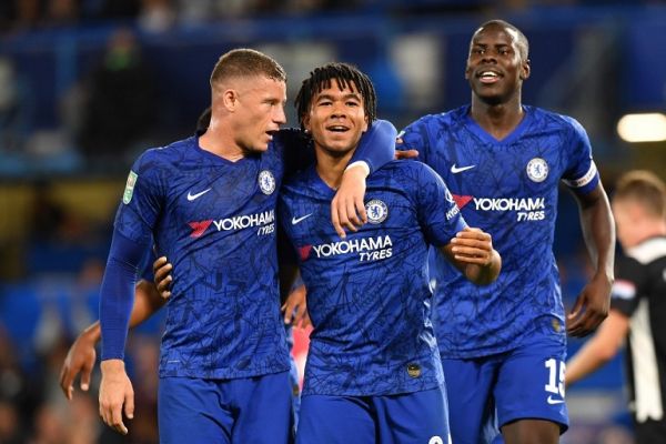 Chelsea's English defender Reece James (C) celebrates with teammates after scoring his team's fifth goal during the English League Cup third round football match between Chelsea and Grimsby Town at Stamford Bridge in south west London, on September 25, 2019. PHOTO | AFP