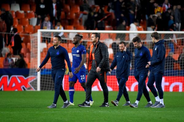 Chelsea's English head coach Frank Lampard (C) and players leave the pitch at the end of the UEFA Champions League Group H football match between Valencia CF and Chelsea FC at the Mestalla stadium in Valencia on November 27, 2019. PHOTO | AFP