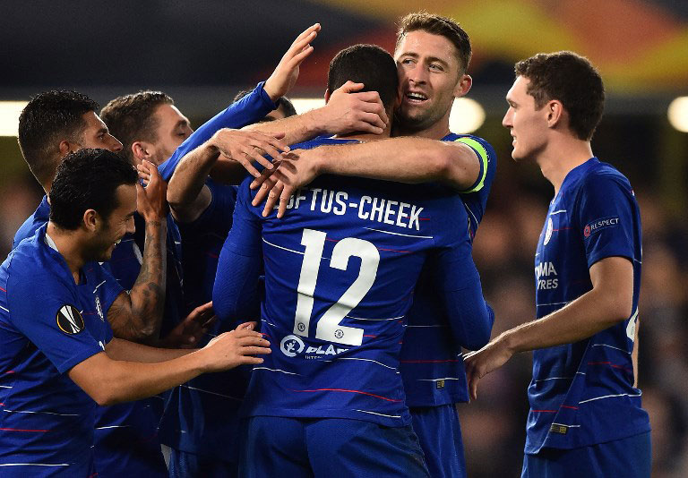 Chelsea's English midfielder Ruben Loftus-Cheek is mobbed by teammates after scoring his hat-trick and his team's third goal during the UEFA Europa League Group L football match between Chelsea and Bate Borisov at Stamford Bridge in London on October 25, 2018. PHOTO/AFP
