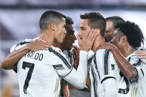 Cristiano Ronaldo of Juventus FC celebrates with Rodrigo Bentancur of Juventus FC scoring second goal during the Serie A match between AS Roma and Juventus FC at Stadio Olimpico, Rome, Italy on 27 September 2020. PHOTO | AFP