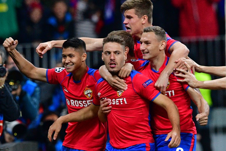 CSKA Moscow's Croatian midfielder Nikola Vlasic (C) celebrates with teammates after scoring the opening goal during the UEFA Champions League group G football match between PFC CSKA Moscow and Real Madrid CF at the Luzhniki stadium in Moscow on October 2, 2018. PHOTO/AFP