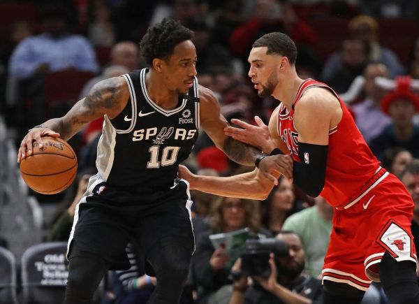 DeMar DeRozan #10 of the San Antonio Spurs moves against Zach LaVine #8 of the Chicago Bulls at the United Center on January 27, 2020 in Chicago, Illinois. PHOTO | AFP