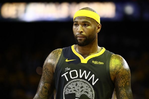 DeMarcus Cousins #0 of the Golden State Warriors reacts against the Toronto Raptors in the second half during Game Six of the 2019 NBA Finals at ORACLE Arena on June 13, 2019 in Oakland, California.PHOTO/ GETTY IMAGES