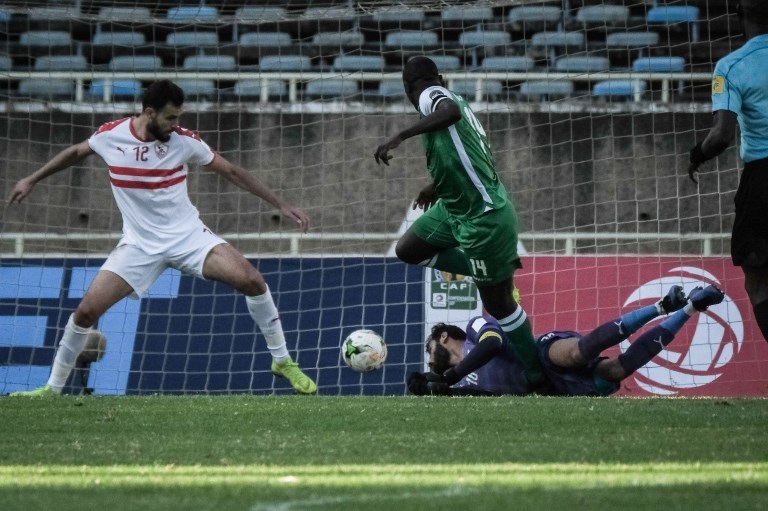 Dennis Oliech (C) of Kenya's Gor Mahia scores against Egypt's Zamalek during their CAF Confederations Cup match at Kasarani Stadium in Nairobi, Kenya, on Februrary 3, 2019. Kenya's Gor Mahia won by 4-2 against Egypt's Zamalek. PHOTO/AFP