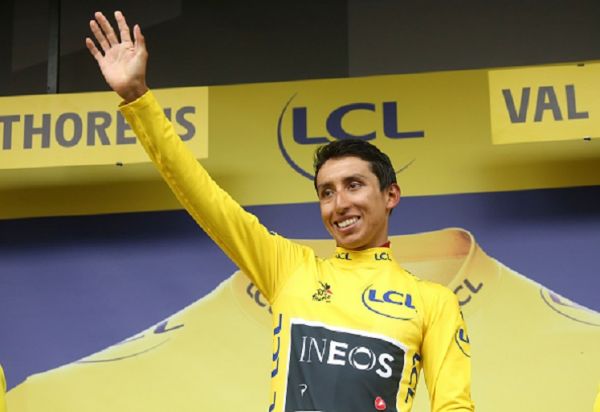 Egan Bernal Gomez of Colombia and Team Ineos retains the yellow jersey of leader of the race during the podium ceremony following stage 20 of the 106th Tour de France 2019, a stage from Albertville to Val Thorens (59km) on July 27, 2019 in Val Thorens, France. PHOTO/ GETTY IMAGES