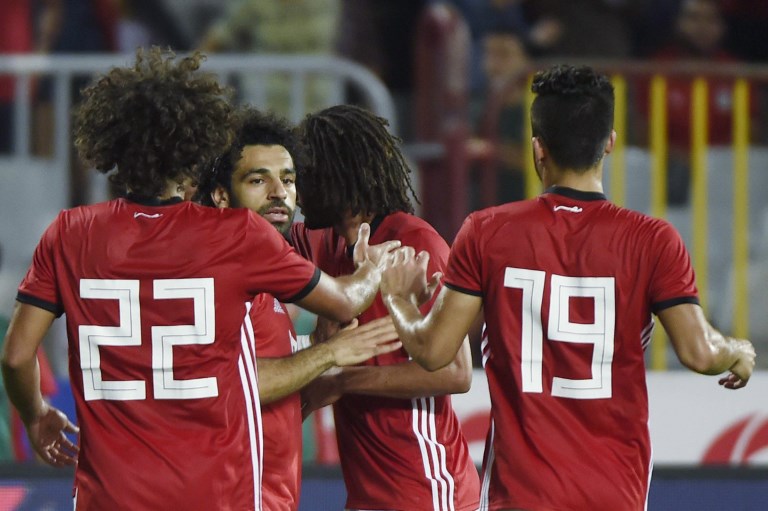 Egypt’s Mohamed Salah (C) celebrates his goal with teammates during the Africa Cup of Nations qualifier match between Egypt and Niger on September 8, 2018 in Borg el-Arab stadium near the Mediterranean city of Alexandria. PHOTO/AFP