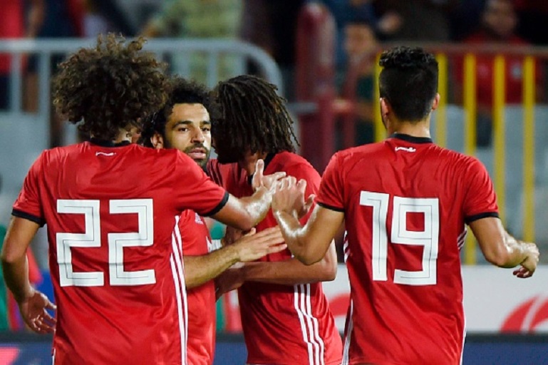 Egypts Mohamed Salah (C) celebrates his goal with teammates during the Africa Cup of Nations qualifier match between Egypt and Niger on September 8, 2018 in Borg el-Arab stadium near the Mediterranean city of Alexandria. PHOTO/GettyImages