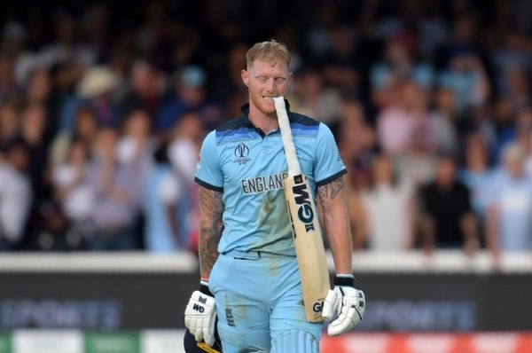 England's Ben Stokes holds his bat in his teeth ahead of a 'super over' during the 2019 Cricket World Cup final between England and New Zealand at Lord's Cricket Ground in London on July 14, 2019. PHOTO | AFP