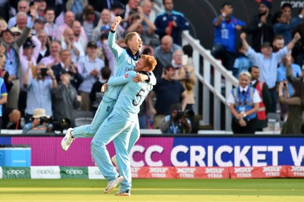 England's Joe Root (L) and England's Jonny Bairstow celebrate after winning the 2019 Cricket World Cup final between England and New Zealand at Lord's Cricket Ground in London on July 14, 2019. England won the World Cup for the first time as they beat New Zealand in a Super Over after a nerve-shredding final ended in a tie at Lord's on Sunday. PHOTO | AFP