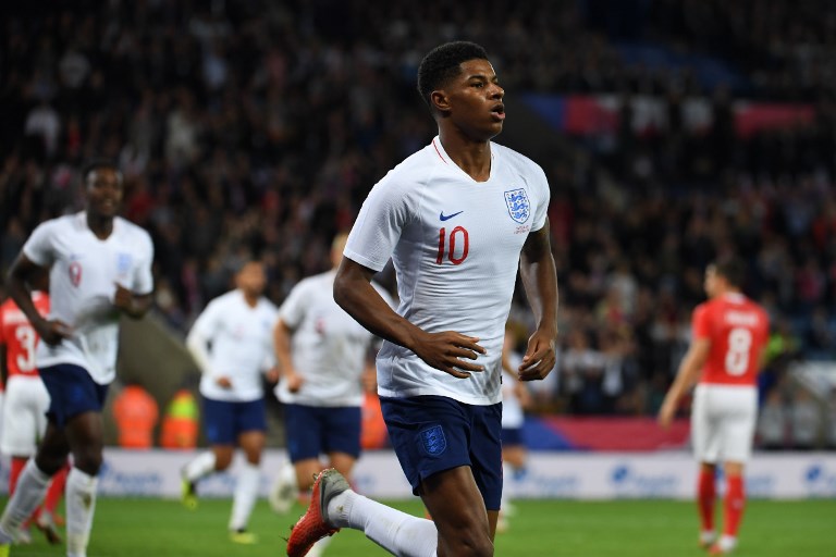 England's striker Marcus Rashford celebrates after scoring during a friendly international football match between England and Switzerland at the King Power stadium in Leicester on September 11, 2018. PHOTO/AFP