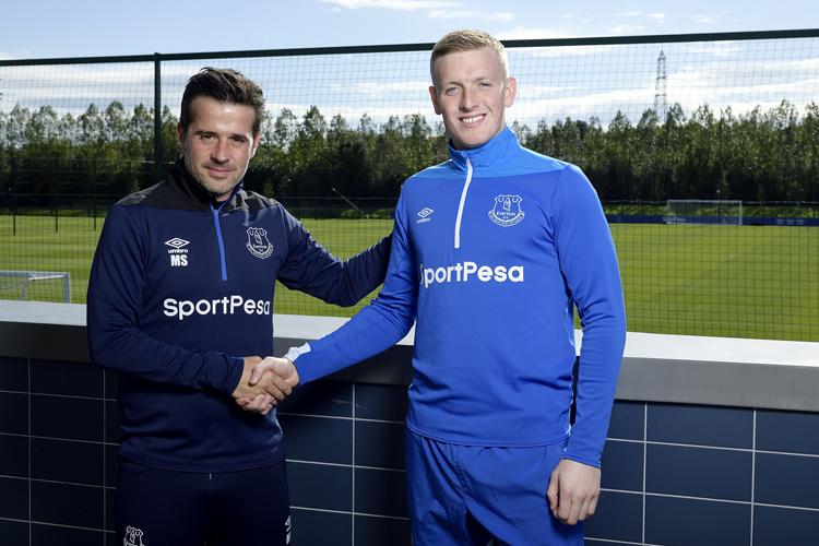 Everton FC manager, Marco Silva (left) greets keeper Jordan Pickford after the England number one signed a six-year deal at the club on September 26, 2018. PHOTO/Everton FC