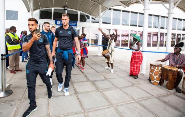 Everton FC star Theo Walcott (foreground) videos his arrival in Nairobi when the Blues touched down at the Jomo Kenyatta International Airport on Saturday, July 6, 2019 for their game against Kariobangi Sharks FC in an international friendly branded SportPesa Cup. PHOTO/SPN