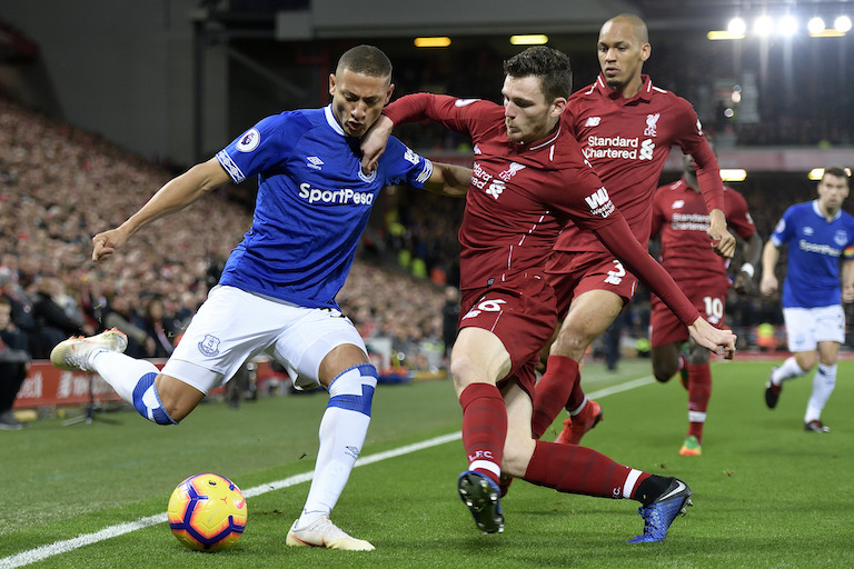 Everton FC striker, Richarlison (left) in action in the Merseyside derby against Liverpool FC at Anfield on December 2, 2018. PHOTO/Everton
