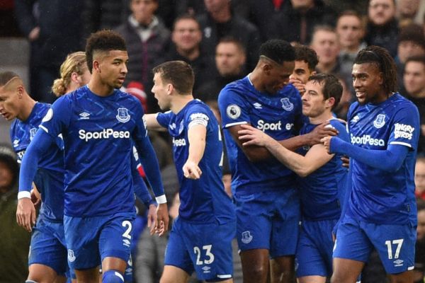 Everton players celebrate a Manchester United own goal for their first goal during the English Premier League football match between Manchester United and Everton at Old Trafford in Manchester, north west England, on December 15, 2019. PHOTO | AFP