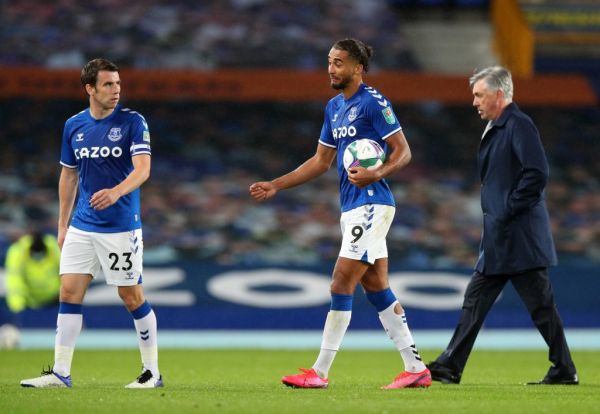 Everton's English striker Dominic Calvert-Lewin (C) walks off the pitch with the match ball after scoring a hat-trick during the English League Cup fourth round football match between Everton and West Ham United at Goodison Park in Liverpool, north west England on September 30, 2020. PHOTO | AFP