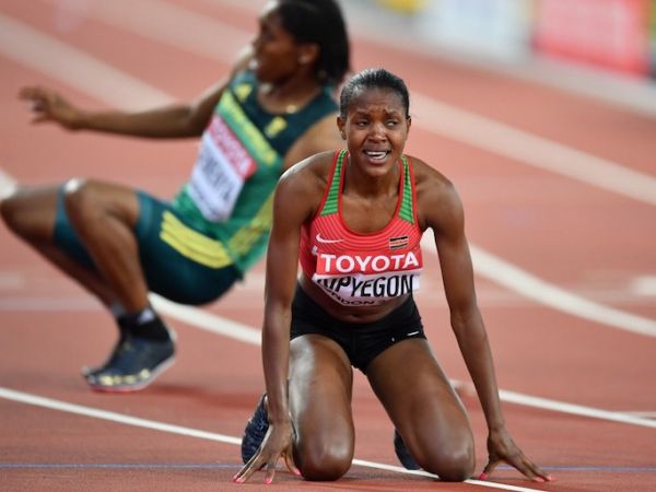 Faith Chepngetich Kipyegon of Kenya reacts as she wins gold in the women's 1500 metres final during the "IAAF Athletics World Championships London 2017" at London Stadium in the Queen Elizabeth Olympic Park in London, United Kingdom on August 7, 2017. PHOTO/AFP