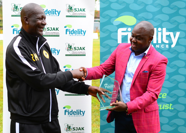 Fidelity Insurance Marketing and Business Development Manager Nicholas Malesi (right) presents the Fidelity Coach of the Month award to Tusker FC head coach Robert Matano on Tuesday, December 3, 2018. PHOTO/Courtesy