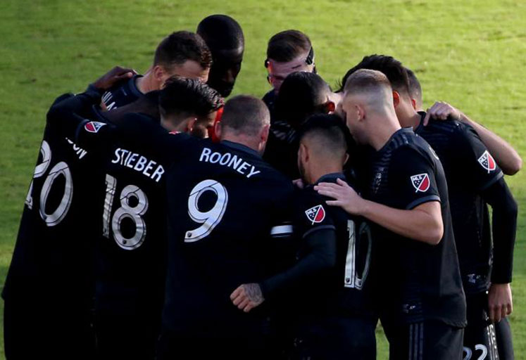 Former England captain, Wayne Rooney (centre) and his DC United teammates hurdle during their MLS clash against Toronto FC on October 15, 2018. His world class free kick lifted his team to a 1-0 victory, leaving them only a win short of the MLS play-off. PHOTO/Courtesy/DC United 