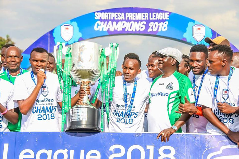 Former Prime Minister, Raila Odinga (3rd right, foreground) joins members of Gor Mahia FC team when they lifted the 2018 SportPesa Premier League trophy on September 25, 2018 at Moi Stadium, Kisumu. PHOTO/Brian Kinyanjui/SPN