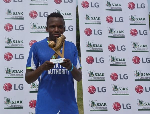 Former Zoo FC midfielder Danson Chetambe poses with the May/June LG/SJAK player of the month award at the Mbaraki Stadium in Mombasa, Kenya on Monday, July 29, 2019. PHOTO | COURTESY