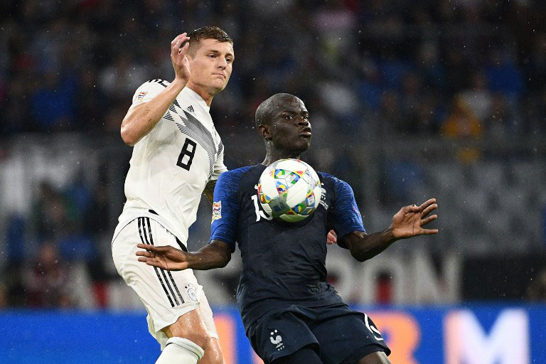 France's midfielder N'Golo Kante vies with Germany's midfielder Toni Kroos during the UEFA Nations League football match Germany against France on September 6, 2018 at the Allianz Arena in Munich, southern Germany. PHOTO/AFP