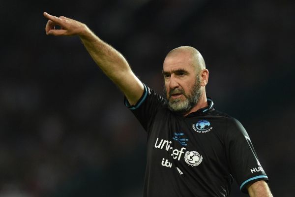 French former international Eric Cantona gestures during an England V Soccer Aid World XI charity football match for Soccer Aid for Unicef at Old Trafford in Manchester, northwest England on June 10, 2018. PHOTO | AFP