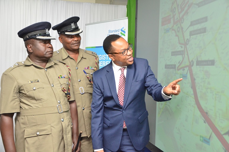 From L to R: Nairobi Area Traffic 2 Police, Geoffrey Njogu, Nairobi Regional Police, Japheth Kibuga Chairman of  Local Organising Committee Standard Chartered Nairobi Marathon, Peter Gitau,during a press conference at the city on Thursday October 24, 2018.PHOTO/COURTESY