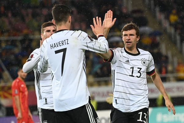 Germany's Kai Havertz (centre) celebrates with team-mates Thomas Müller (right) and Timo Werner after scoring the 1:0 goal. PHOTO | Alamy