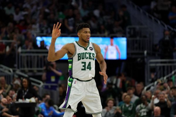 Giannis Antetokounmpo #34 of the Milwaukee Bucks reacts to a three point shot during the second half of Game Three of the Eastern Conference Semifinals against the Boston Celtics at Fiserv Forum on May 07, 2022 in Milwaukee, Wisconsin. PHOTO | AFP