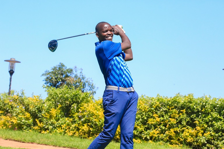 Golf Park's Tony Omuli follows the flight of his ball during the opening round of the fourth leg of the Safari Golf Series in Thika on Monday, December 17, 2018. He ended as the club house leader with a 3-under par 69. PHOTO/Courtesy