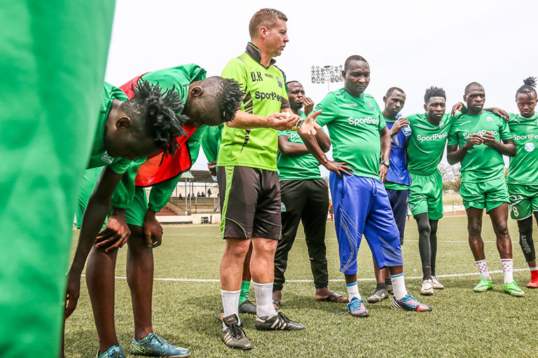 Gor head coach, Dylan Kerr (third left) and his assistant Zedekiah ‘Zico’ Otieno instruct their players ahead of their SportPesa Premier League clash against Mathare United FC at Moi Stadium, Kisumu on Saturday, September 29, 2018. PHOTO/SPN