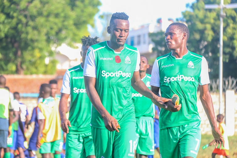 Gor Mahia FC captain Harun Shakava and Nicholas Kipkirui walk off the pitch after their 2-1 SPL defeat to Bandari FC at the Mbaraki Sports Complex on Saturday, December 8, 2018. PHOTO/SPN